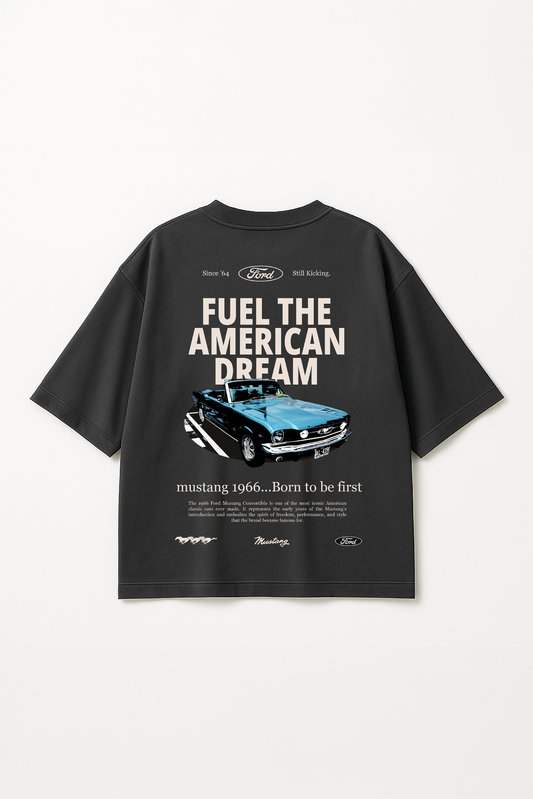 Flat lay of Version Originale’s "Mustang" tee in charcoal grey featuring a bold back graphic print of a 1966 Mustang car with the text “Fuel the American Dream