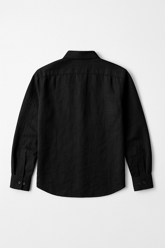 Flat lay of back view of a classic long sleeve black linen shirt by Version Originale