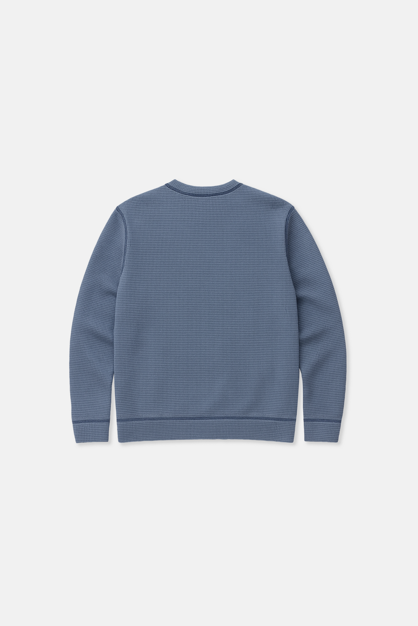 Blue waffle knit sweatshirt on a white background