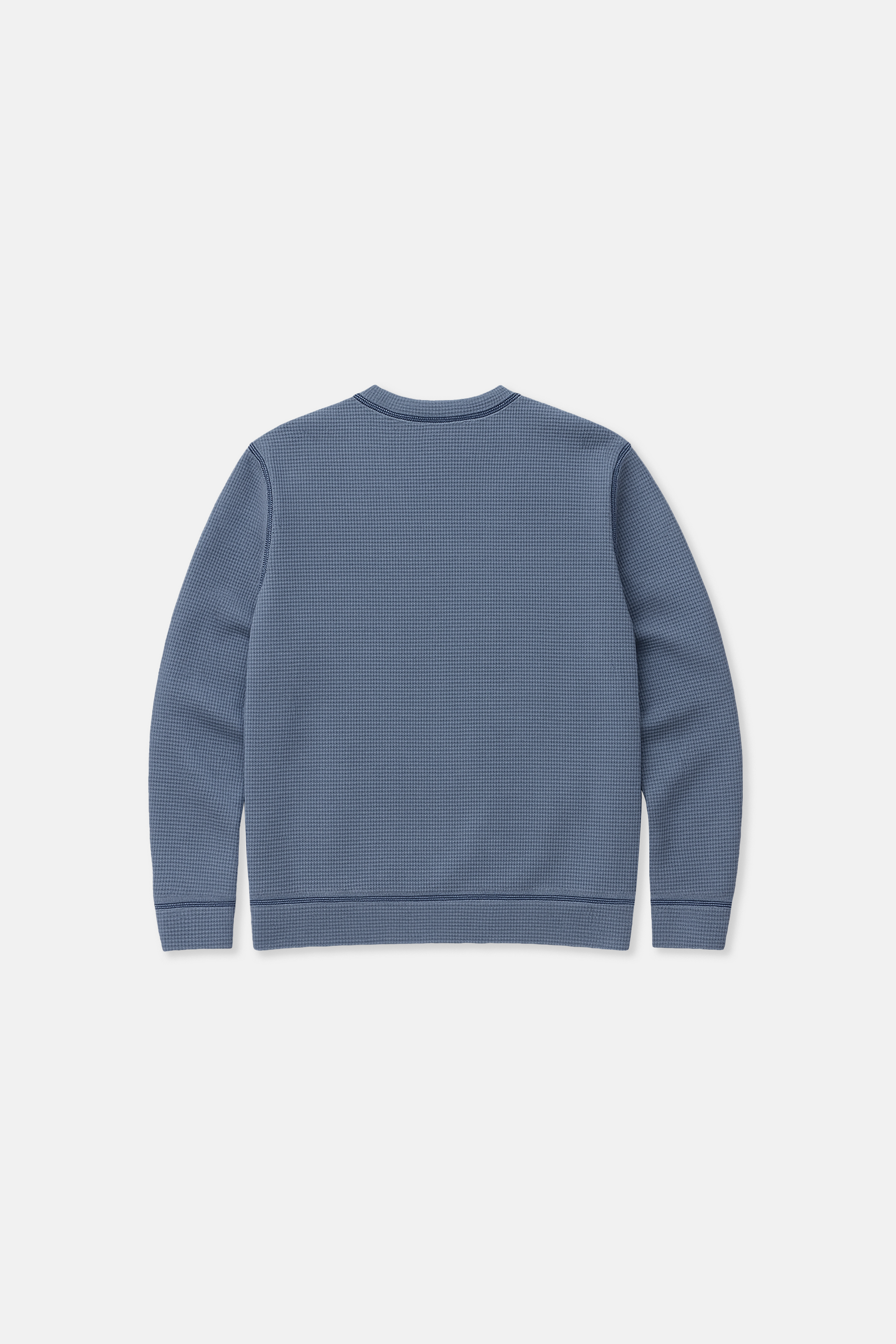 Blue waffle knit sweatshirt on a white background