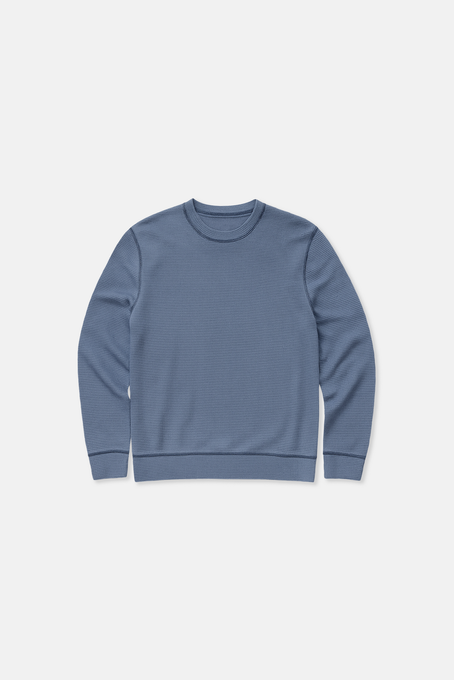 Blue waffle knit sweatshirt on a white background
